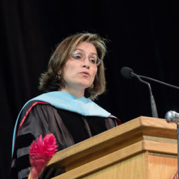 Commencement speaker reminds graduate students to take note of the mile markers on the way to the milestones