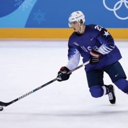Troy Terry became DU’s first current student-athlete to skate in the Olympics for Team USA in hockey. Photo: Jean Catuffe/Getty